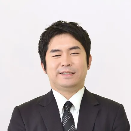 葬祭プランナーの吉岡 雄次